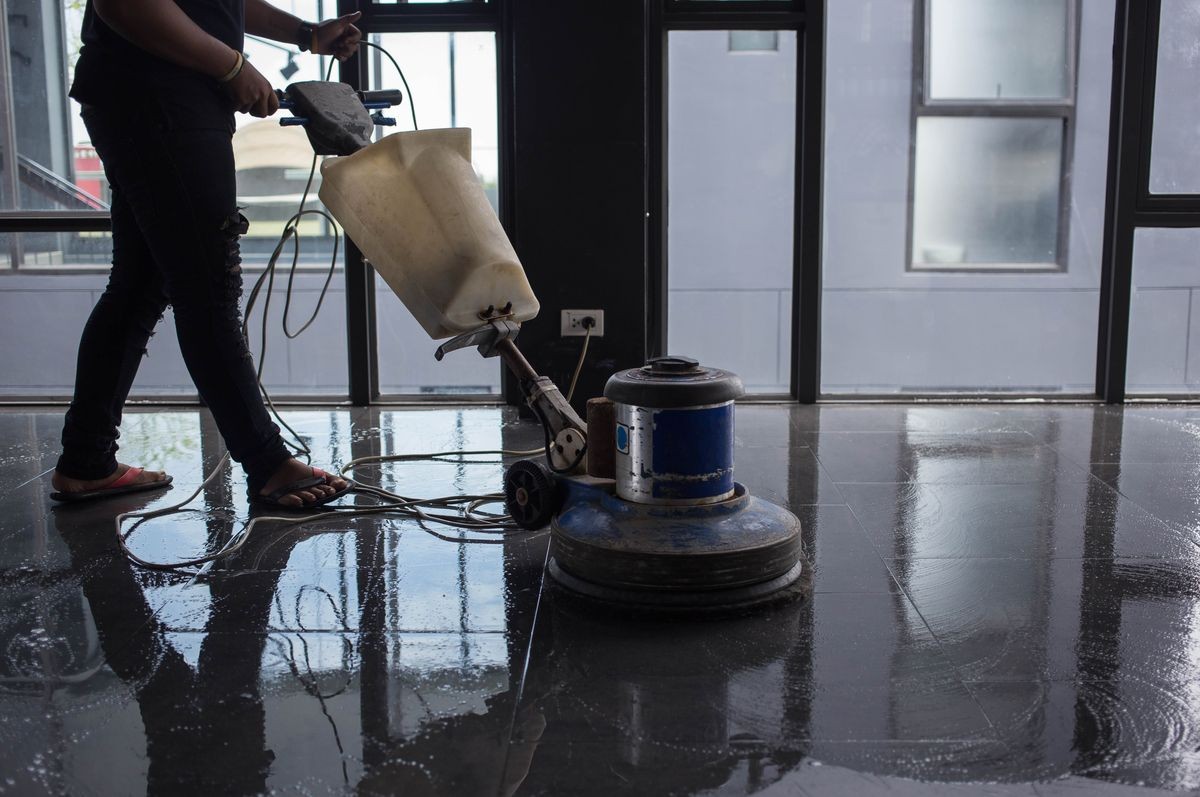 The people cleaning floor with machine, deep cleaning service, professional clean, commercial space cleaning, retail unit cleaning, warehouse cleaning
